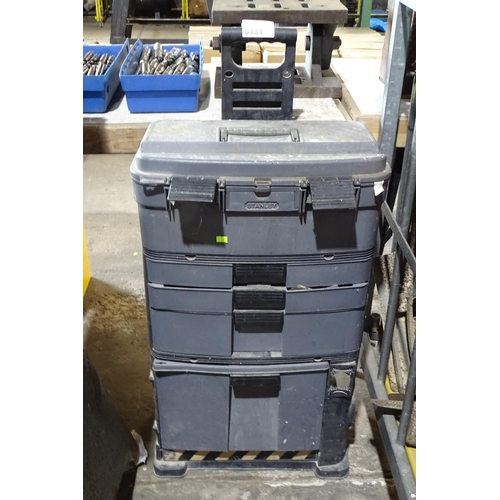 5131 - A Stanley roller tool box with telescopic handle containing a quantity of various tools etc. Not pra... 