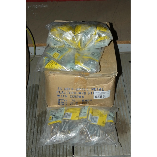 5558 - A quantity of self drill metal plasterboard fixings with screws