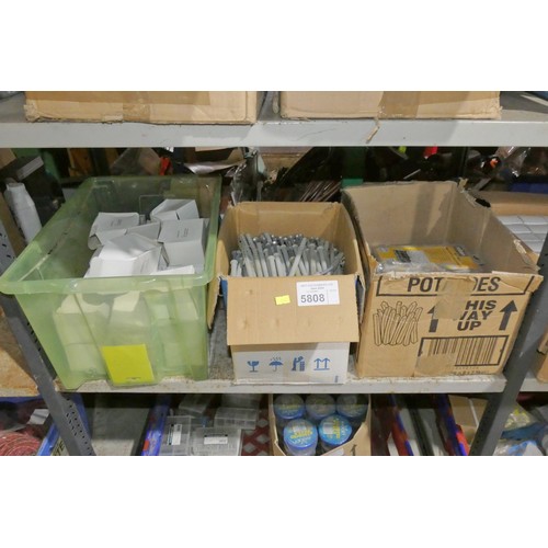 A quantity of wire rope grips, hammer in frame fixings and nut / bolt ...