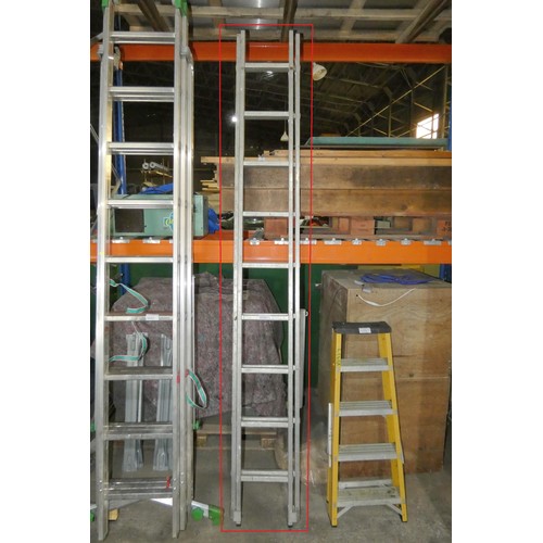 5943 - A double extending aluminium ladder (2 x 9 rung)