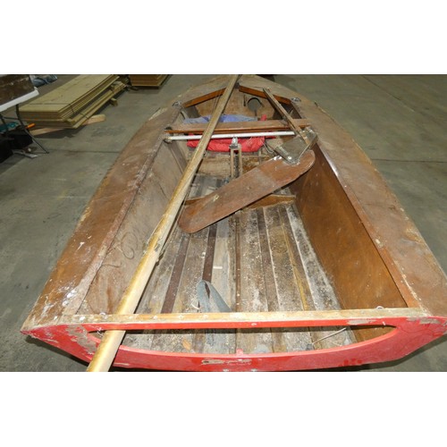 6315 - A plywood built sailing dinghy approx 440cm long x 175cm wide, possibly an International Cadet saili... 