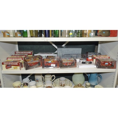 3084 - A quantity of miscellaneous decorative boxed diecast model vehicles etc and various watches and badg... 