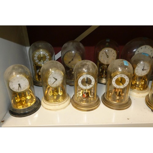 3010 - A collection of miscellaneous decorative 400-day domed clocks (one shelf)