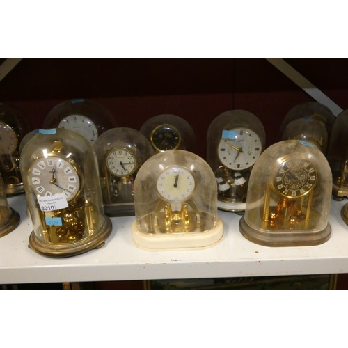 3010 - A collection of miscellaneous decorative 400-day domed clocks (one shelf)