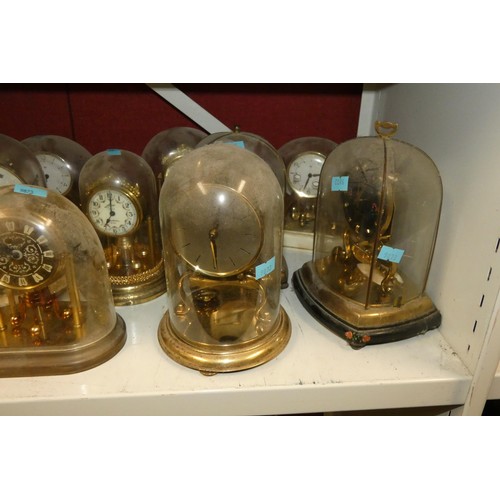 3010 - A collection of miscellaneous decorative 400-day domed clocks (one shelf)