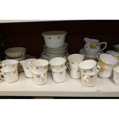 3017 - Four decorative glass vases and a quantity of miscellaneous decorative tea ware etc (one shelf)