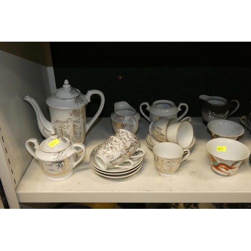 3040 - A quantity of miscellaneous highly decorative Japanese teaware (two shelves)