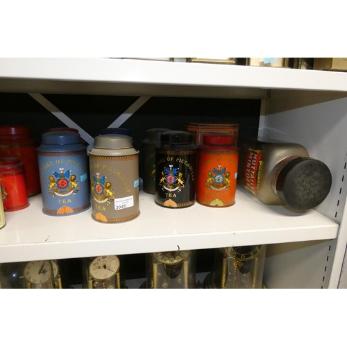 3045 - A quantity of miscellaneous decorative vintage storage tins (one shelf)