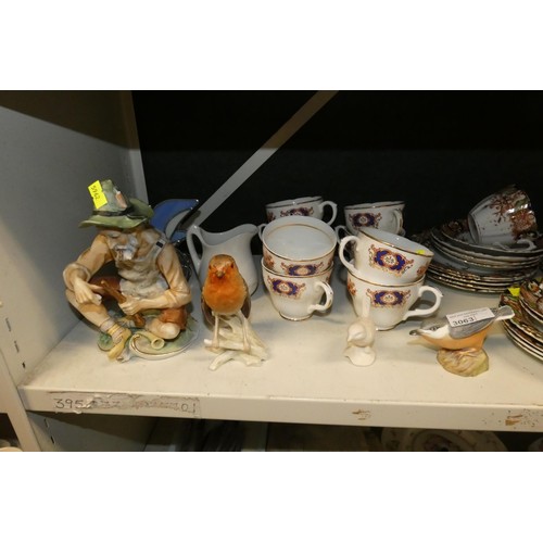 3063 - A quantity of miscellaneous decorative teaware, ornaments and sundries (two shelves)