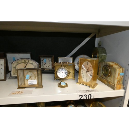 3070 - A quantity of miscellaneous decorative vintage mantle and bedside clocks (one shelf)