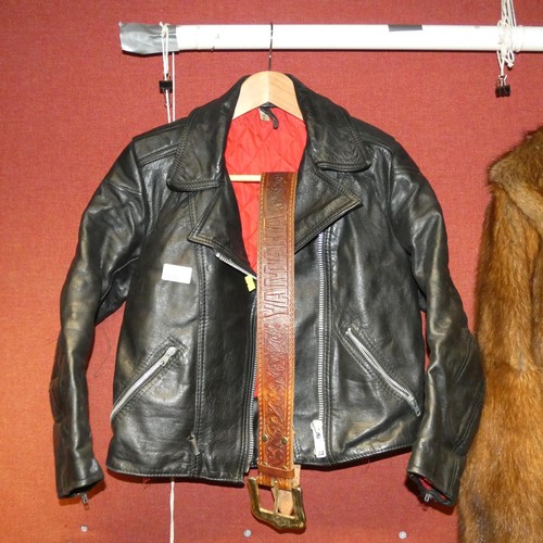 3106 - A vintage black leather biker's jacket and a Yamaha leather belt