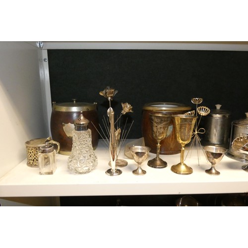 3079 - A quantity of miscellaneous decorative silver plated ware and cutlery etc (four shelves)