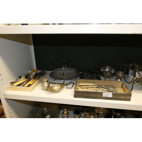 3079 - A quantity of miscellaneous decorative silver plated ware and cutlery etc (four shelves)