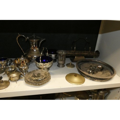 3079 - A quantity of miscellaneous decorative silver plated ware and cutlery etc (four shelves)