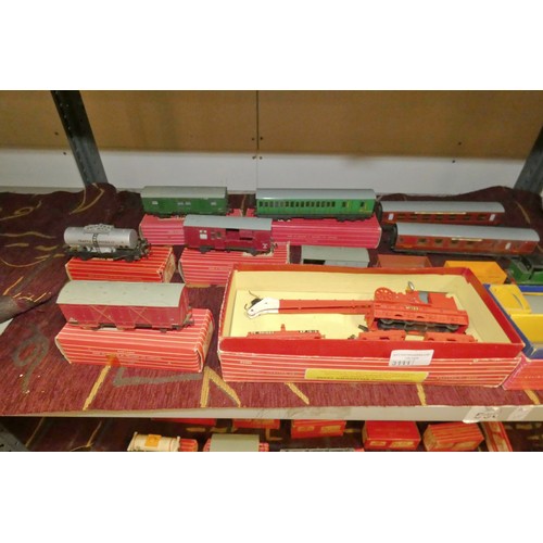 3111 - A quantity of vintage Hornby-Dublo model railway rolling stock, some with boxes (2 shelves)