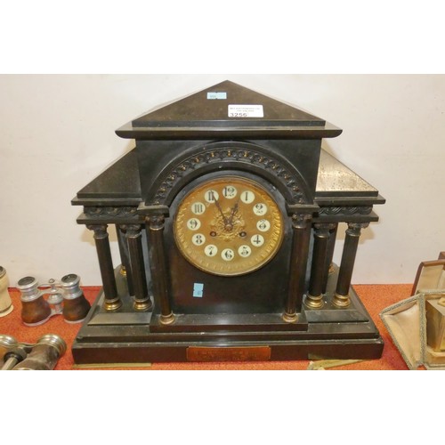 A large Edwardian black marble temple style mantle clock