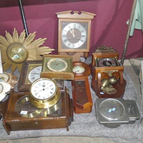 A quantity of miscellaneous decorative Sunburst and other wall clocks ...