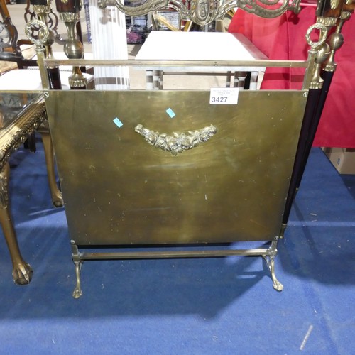 3427 - A brass decorative fire screen