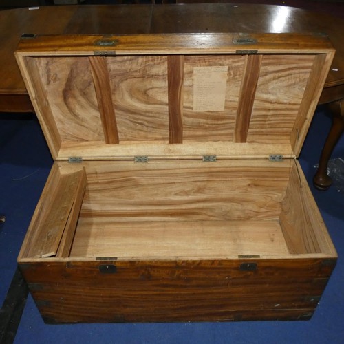 3449 - A large 19th century brass bound hardwood travelling trunk with a lift lid and side handles