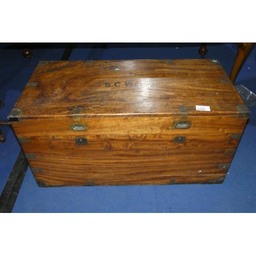 3449 - A large 19th century brass bound hardwood travelling trunk with a lift lid and side handles