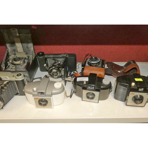 3006 - A collection of miscellaneous bellows cameras, later 1960s cameras and other photographic equipment ... 