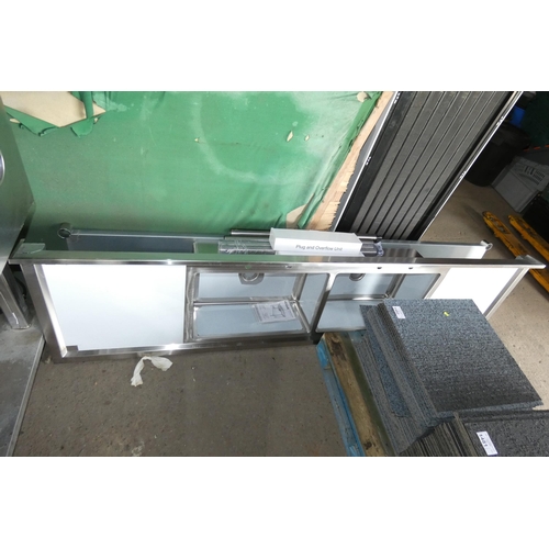 1001 - An unused commercial stainless steel double sink unit with legs, shelf etc, please note the legs wil... 