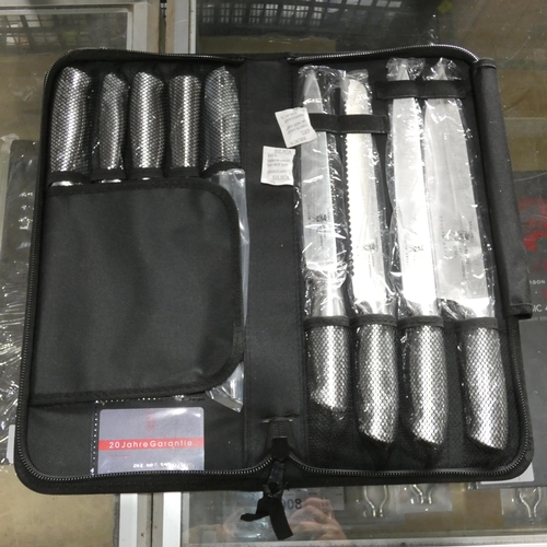 1014 - A 9 piece knive set with soft carry case by Samurai