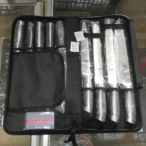 1015 - A 9 piece knive set with soft carry case by Samurai