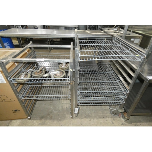 1144 - A commercial stainless steel tray rack, has been modified into 2 mobile parts