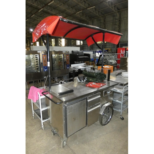 1211 - A commercial stainless steel mobile pull along coffee serving cart, comes with a red canopy, 3 drawe... 