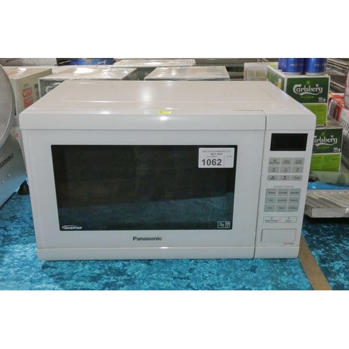 1062 - A microwave oven by Panasonic type NN-ST452W 900W - trade  TESTED WORKING