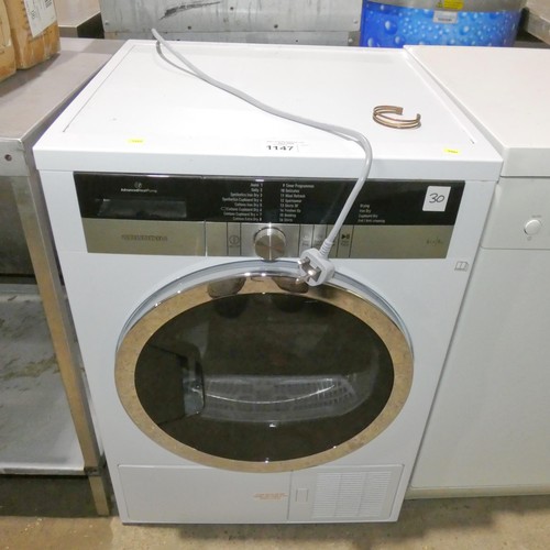 1147 - A condenser tumble dryer by Grundig 8kg type R134s - trade