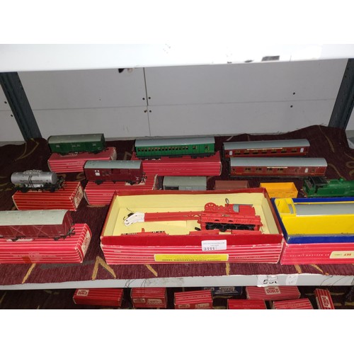 3111 - A quantity of vintage Hornby-Dublo model railway rolling stock, some with boxes (2 shelves)