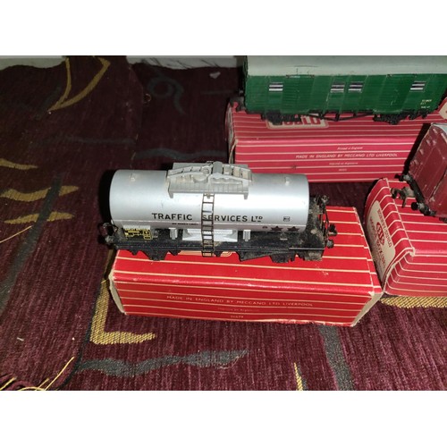 3111 - A quantity of vintage Hornby-Dublo model railway rolling stock, some with boxes (2 shelves)