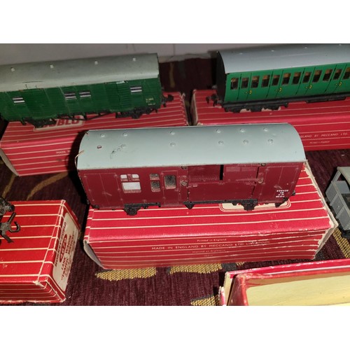 3111 - A quantity of vintage Hornby-Dublo model railway rolling stock, some with boxes (2 shelves)