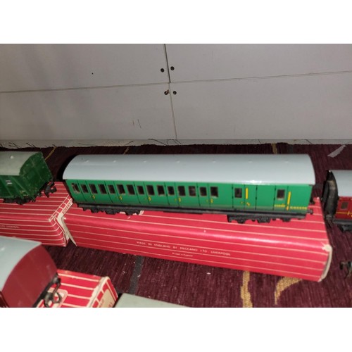 3111 - A quantity of vintage Hornby-Dublo model railway rolling stock, some with boxes (2 shelves)