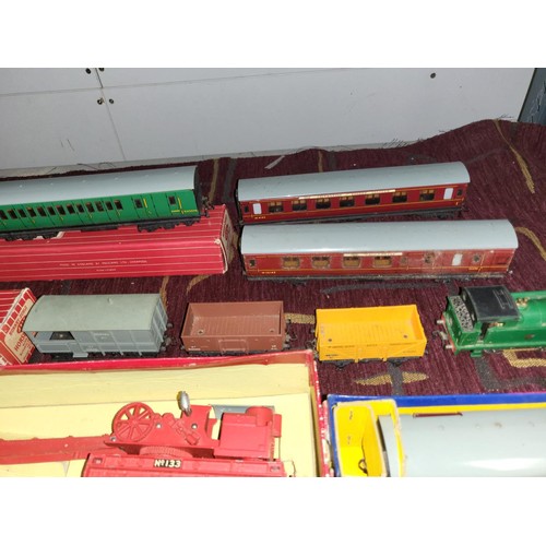 3111 - A quantity of vintage Hornby-Dublo model railway rolling stock, some with boxes (2 shelves)