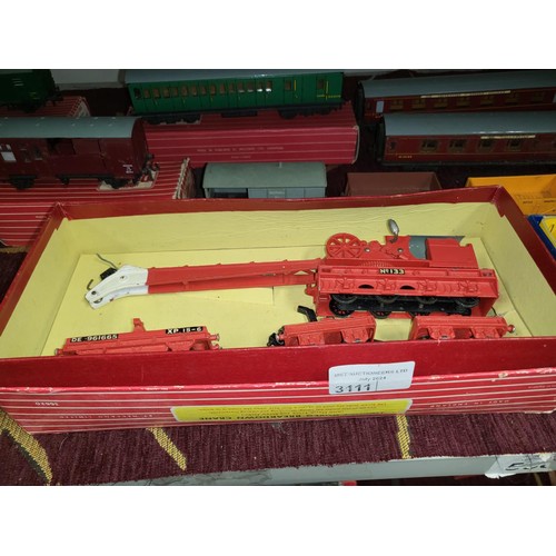 3111 - A quantity of vintage Hornby-Dublo model railway rolling stock, some with boxes (2 shelves)