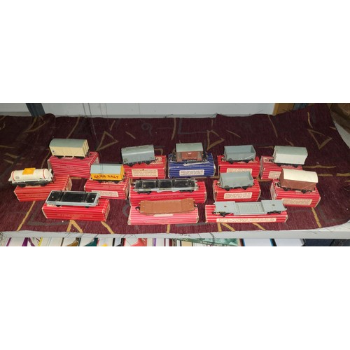 3111 - A quantity of vintage Hornby-Dublo model railway rolling stock, some with boxes (2 shelves)