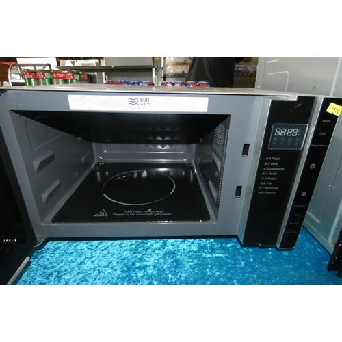 1056 - A 800W microwave oven by Russell Hobbs type RHFM2363S - trade TESTED WORKING