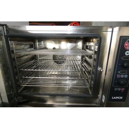 1161 - A commercial stainless steel combi oven by Lainox, fitted with a red commercial 3 phase plug - trade