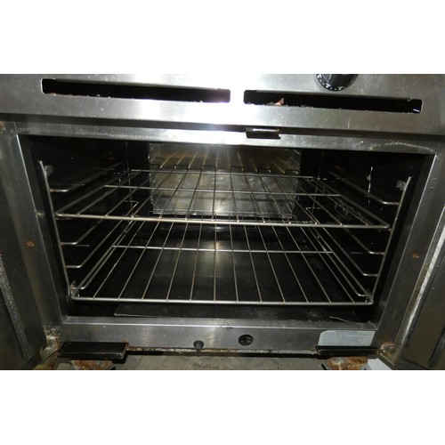 1171 - A commercial stainless steel gas fired mobile 2 door oven - trade