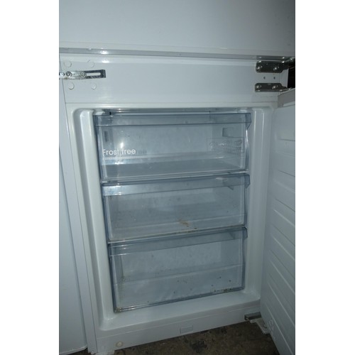 1235 - An integrated fridge freezer by Kenwood type KIFF7017 - trade  TESTED WORKING