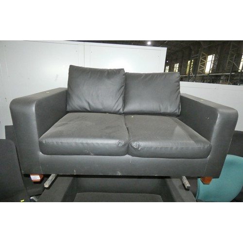 1311 - 1 x black upholstered two person reception type sofa with wooden feet, approx 150cm wide