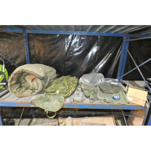 2011 - A quantity of various ex-military items including a sleeping bag, webbing, a ruck sack, survival ite... 