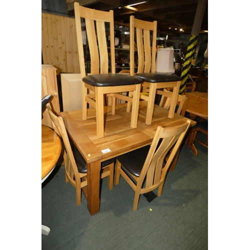 2185 - 1 x light Oak extending dining table approx 135 x 90cm supplied with 2 x 41cm centre extension leafs... 