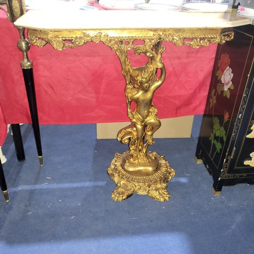 3426 - A gilded cherub console table with marble top