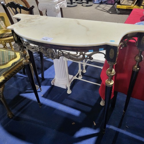 3428 - A marble topped console table with brass accents