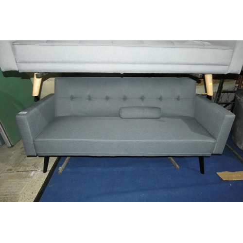 426 - A grey upholstered click clack type sofa bed. Overall the sofa bed is approx 185cm wide