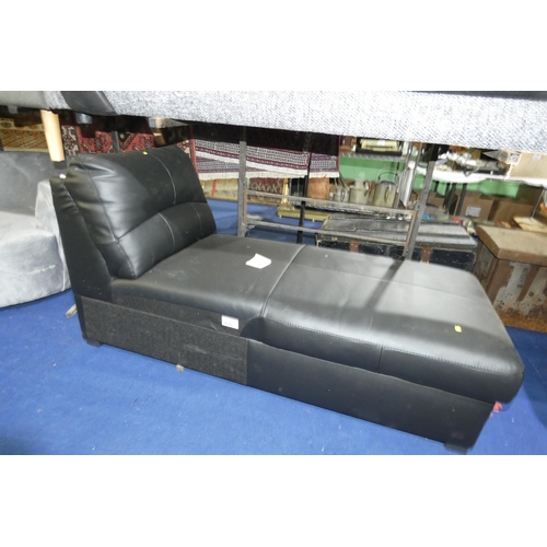 430 - A black upholstered Ottoman type hinged top storage  chaise longue. Please note that no arms are inc... 